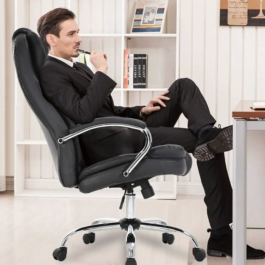 Executive sitting on genuine leather office chair